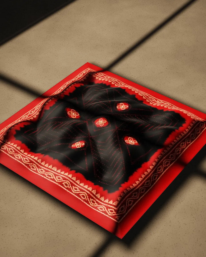 Angaar large bandana, crumpled on a concrete floor