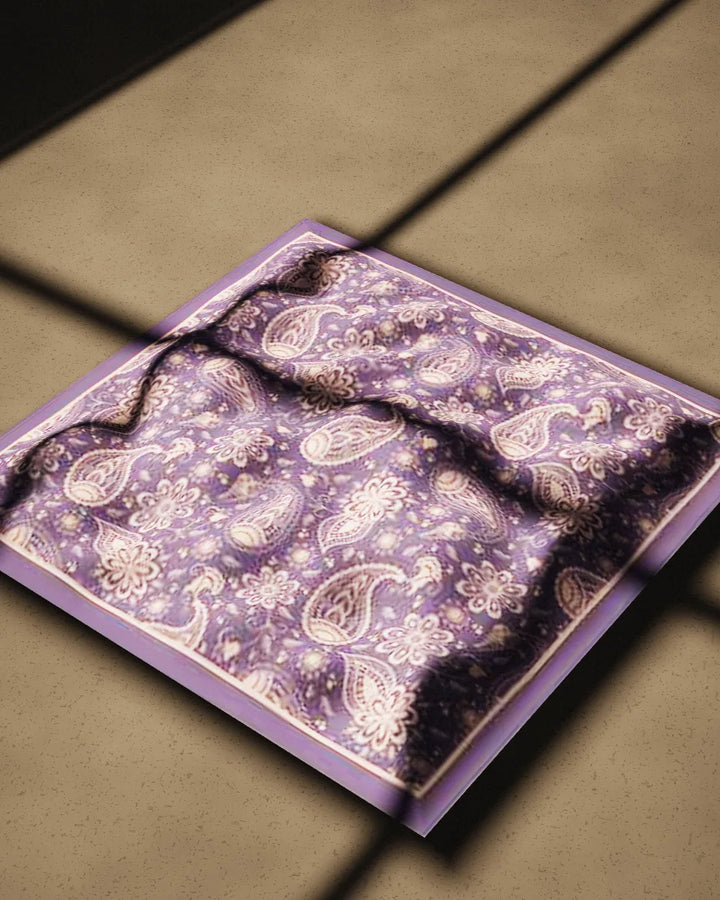 Jamun bandana, crumpled on a concrete floor